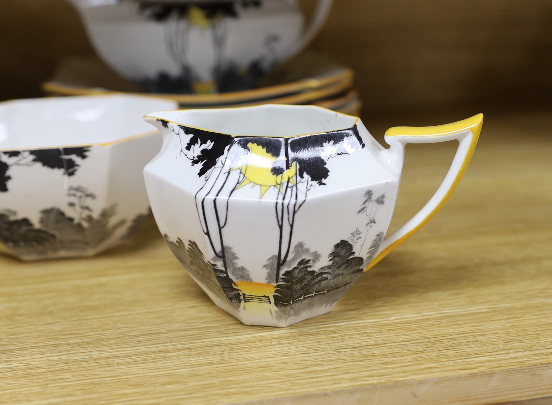 A 1930s Shelley Queen Anne shape Art Deco Sunshine and Tall Trees pattern tea and dinner wares, approx 43 pieces